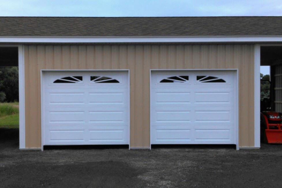 8x7 CHI Overhead Doors w-Sunburst Decorative Inserts Gasport NY