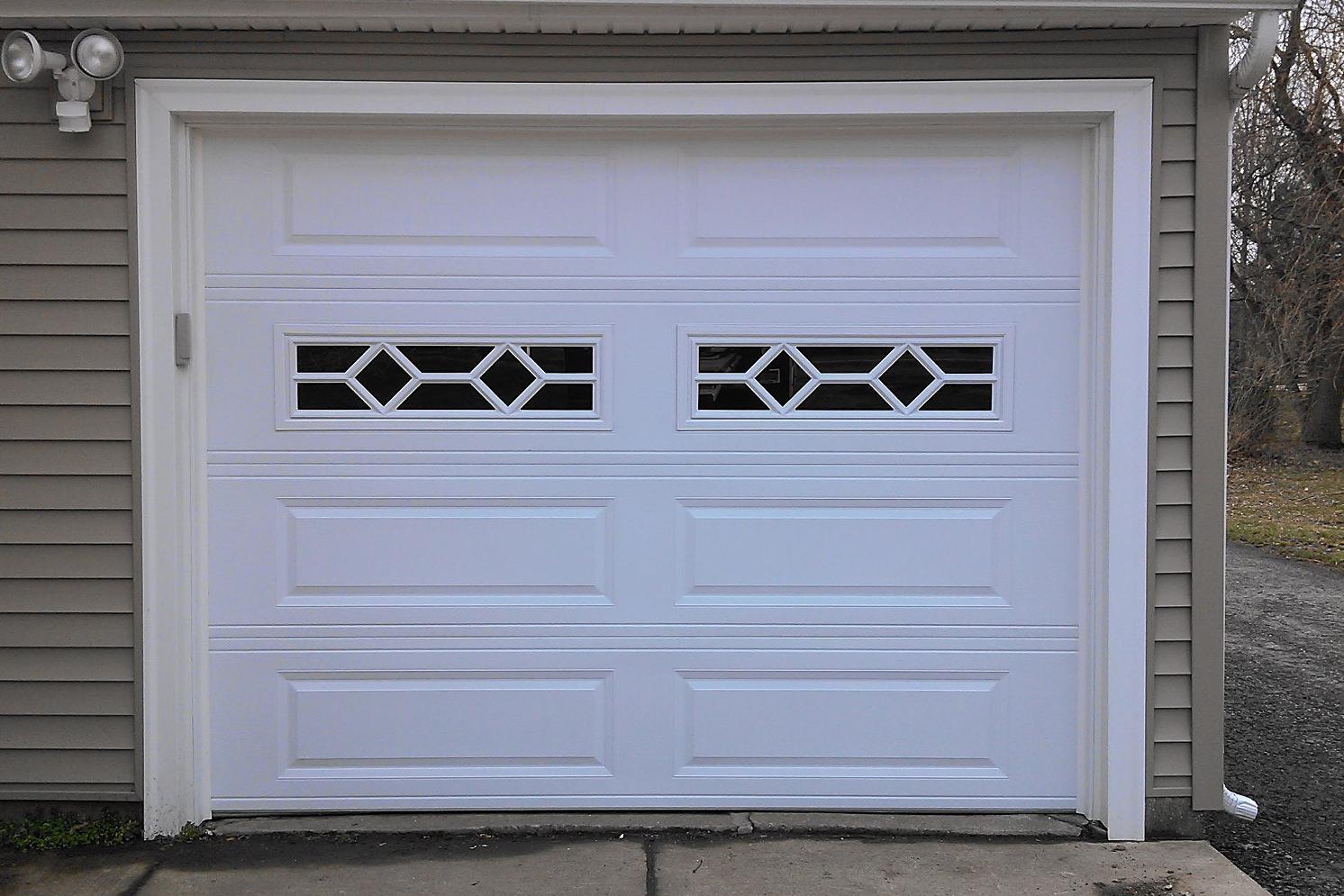 9x7 Overhead Garage Door w-Waterton Decorative Inserts